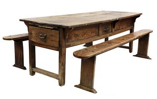 A rustic elm farmhouse kitchen table,