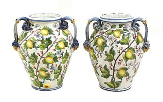 A pair of large tin-glazed earthenware jars,