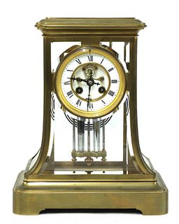 A French brass four-glass mantel clock,