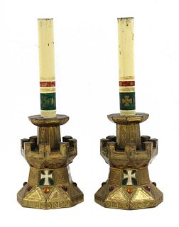A pair of French Gothic gilt candlesticks,