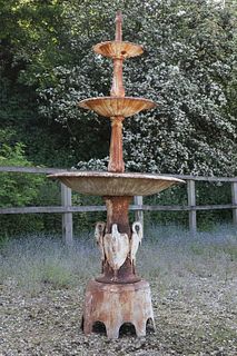 A Victorian-style painted cast iron fountain,