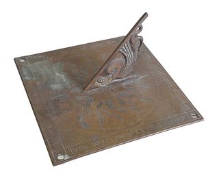 A square brass sundial,