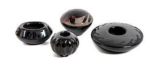Four Santa Clara Blackware Miniature Vessels, Height of the first 3/4 x diameter 3 1/2 inches.