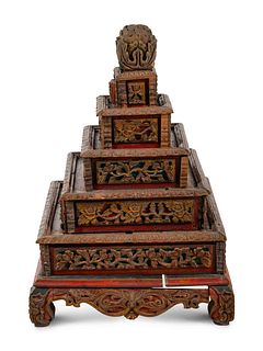 A Mongolian Gilt and Red Lacquered Carved Wood Stand