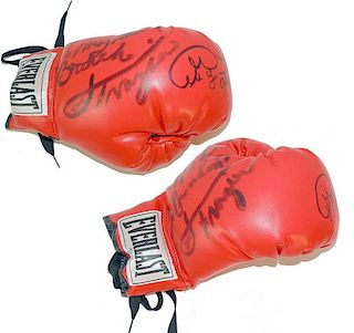 Joe Frazier and George Foreman Signed Boxing Gloves