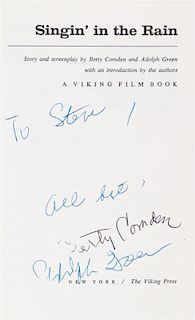 (COMDEN, BETTY AND ADOLPH GREEN) Singing in the Rain. New York, (1972). Inscribed by Comden and Green.
