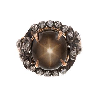 An Antique 14K Black Star Sapphire & Diamond Ring