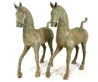 PAIR OF TANG STYLE BRONZE HORSE FIGURES