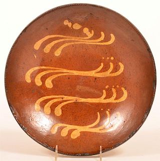 Pennsylvania Redware Pottery Charger.