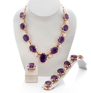 Set of choker, bracelet and ring in 18kt yellow gold, platinum and amethysts views, ca. 1940.