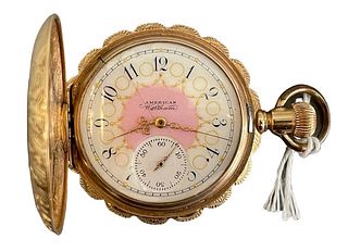 14 Karat Gold Elgin Lapel Closed Face Watch, 13.1 millimeter, 34.1 grams total weight.