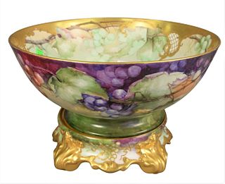 Haviland Porcelain Punch Bowl and Fitted Base, having grape decoration and gilt rim, marked to the underside, diameter 15 inches.