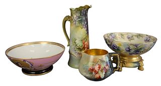 Four Piece Group of Limoge Porcelain, to include a pitcher having a dragon form handle, a bowl resting on a footed base, a large bowl, along with a sh