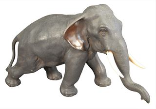 Chinese Bronze Elephant Sculpture, having white tusks, marked with three characters to the underside, height 8 inches, length 12 1/2 inches, width 7 i