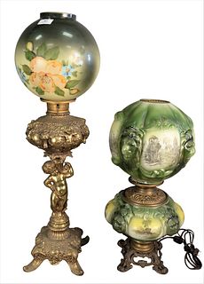 Two Gone with the Wind Lamps, one having green floral shade and figural brass base with puttis, along with a two-part lamp with lion mask (as is), ove