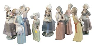 Ten Piece Lot of Lladro Figures, to include girls holding sun hats, one girl having a basket of puppies, one girl holding a duck, along with one with 