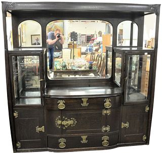 Large Oak Art Nouveau Style Sideboard, having mirror back, two curio cabinets, heavy brass hardware, circa 1910, height 80 inches, width 78 1/2 inches