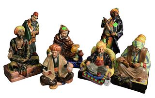 Group of Seven Royal Doulton Porcelain Arabian Figures, to include "Bluebeard", "Carpet Seller", "The Potter", "Abdullah", "Omar Khayyam", "Cobbler", 