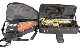 Three Musical Instruments, to include a Kohlert brass saxophone; an autoharp by Oscar Schmidt, both with fitted cases; along with a Casio Privia keybo
