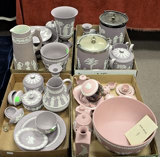 Four Tray Lots of Pink and Purple Wedgwood, to include biscuit jars, vases, pitchers, bowls, boxes, etc.