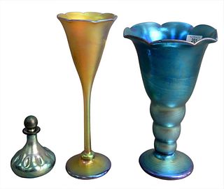 Three Piece Lot, to include two art glass vases, one blue, one gold iridescent; along with one cologne bottle; each spuriously marked Tiffany & Compan