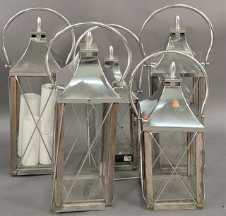 Five Contemporary Outdoor Lanterns, all having matching finish, height 24 and 31 inches.