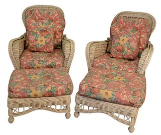Four Piece Lot to include pair of wicker arm chairs and ottomans with upholstered cushions, seat height 13 inches, width 33 inches. 
