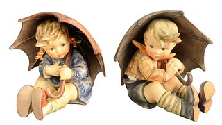 Pair of Large Hummels, to include Umbrella Boy and Umbrella Girl, both marked to the underside, height of each 8 inches.