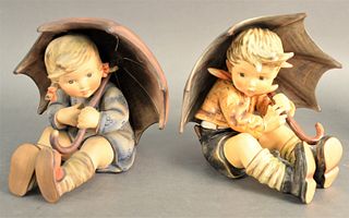 Pair of Large Hummels, Umbrella Boy and Umbrella Girl, both marked to the underside, height of each 8 inches.