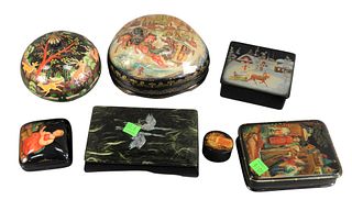 Group of Seven Russian Lacquer Boxes, to include a large molded oval box having three scenes, a large green box having two swans on the lid, along wit