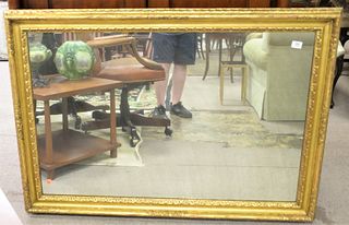Two Mirrors, to include large rectangle mirror, having gold frame, 38" x 54"; along with an oval mirror, width 31 1/2 inches.