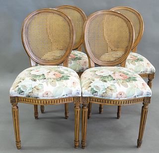 Set of Four Side Chairs, having caned backs and floral upholstered seats, seat height 18 1/2 inches.