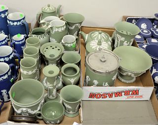 Three Tray Lots of Moss Green Wedgwood Jasperware, to include candlesticks, vases, bowls, covered jars, urns, etc., vase height 7 1/4 inches.
