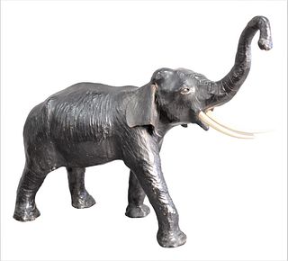 Leather Elephant Form, early 20th century, possibly Abercrombie & Fitch, height 20 inches, width 8 1/2 inches, length 28 inches.