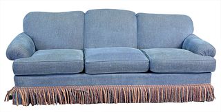 Ashley Manor Upholstered Sofa, having blue upholstery with fringe skirt, length 83 inches.
