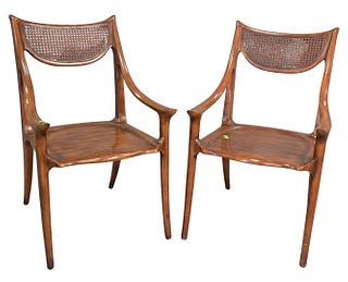 Pair of Keno Brothers for Stickley Slope Armchairs, having rush backs and brass tags to the underside, height 38 inches, seat height 17 1/2 inches.