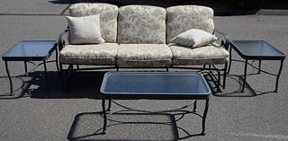 Four Piece Outdoor Lot, to include sofa/glider with cushions, along with a pair of end tables and a coffee table, sofa length 73 inches.
