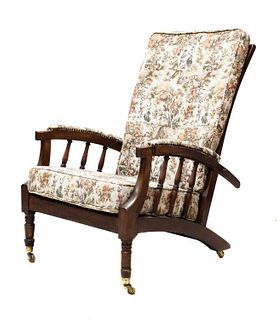 A pair of Morris-type mahogany reclining armchairs,