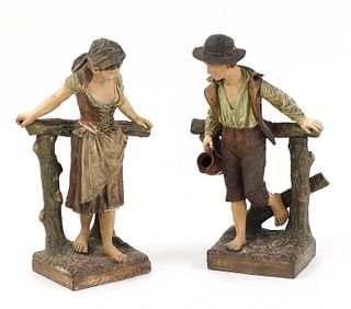A pair of Bretby Art Pottery figures,