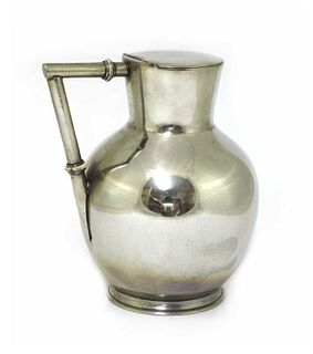 A silver-plated lidded jug,