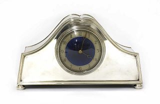 An Arts and Crafts silver-plated mantel clock,