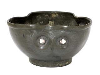 An Arts and Crafts pewter 'owl' bowl,
