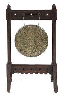 A Gothic oak dinner gong,