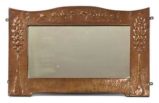 A Scottish Arts and Crafts embossed copper wall mirror,