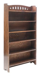An Arts and Crafts oak bookcase,