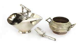 A silver-plated sugar bowl and shovel,