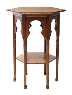 A Liberty oak lamp table,