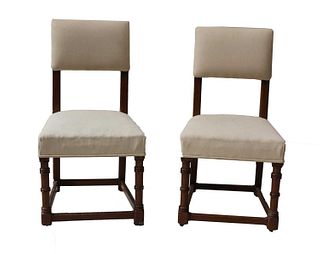 A pair of oak side chairs,