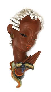 A Goldscheider pottery wall mask,