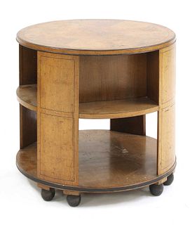 An Art Deco walnut circular book table,